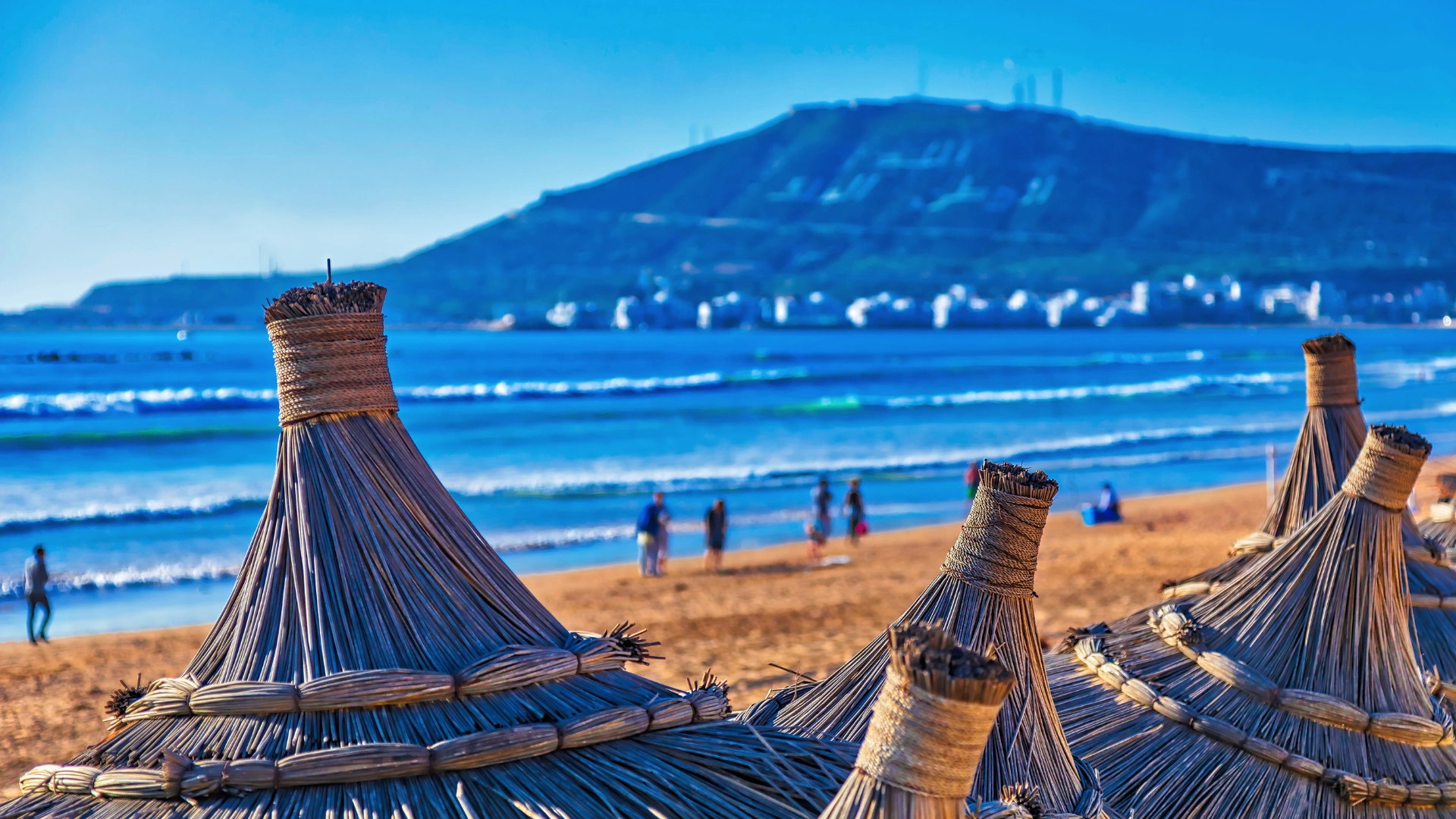 Beautiful coastal view of Agadir, Morocco – golden beaches, vibrant city life, and stunning Atlantic Ocean sunsets
