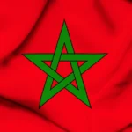 Flag Of Morocco with a red background and green star symbolizing strength and unity