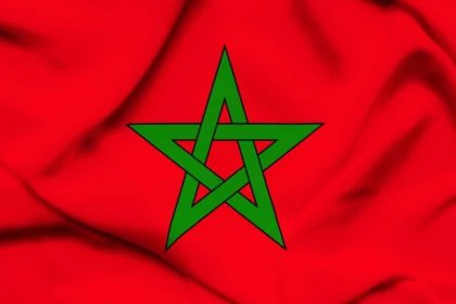 Flag Of Morocco with a red background and green star symbolizing strength and unity
