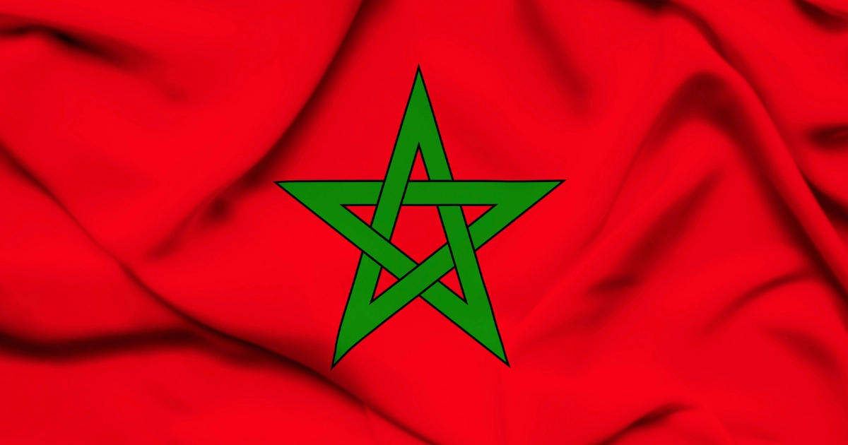 Flag Of Morocco with a red background and green star symbolizing strength and unity