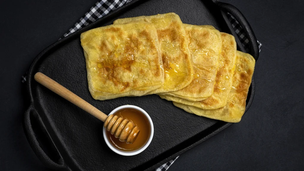 Traditional Moroccan Msemen flatbread served fresh and golden.